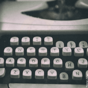 picture of typewriter with grainy black and white