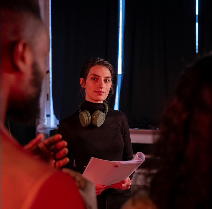 image of a screenwriter networking on a film set